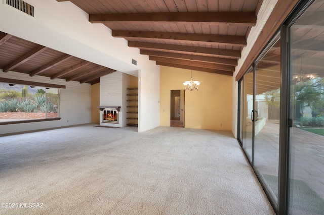 interior space with a warm lit fireplace, lofted ceiling with beams, wooden ceiling, carpet floors, and visible vents