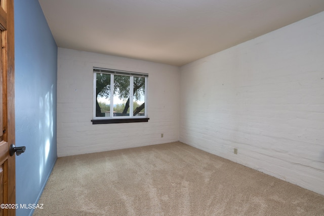 empty room with carpet flooring