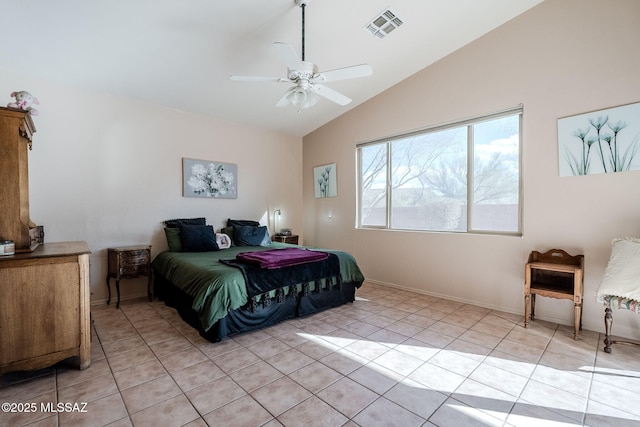 bedroom with light tile patterned floors, ceiling fan, visible vents, baseboards, and vaulted ceiling