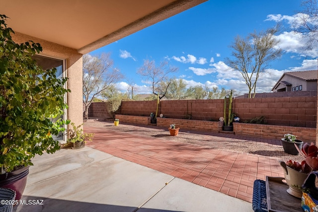 view of patio with a fenced backyard