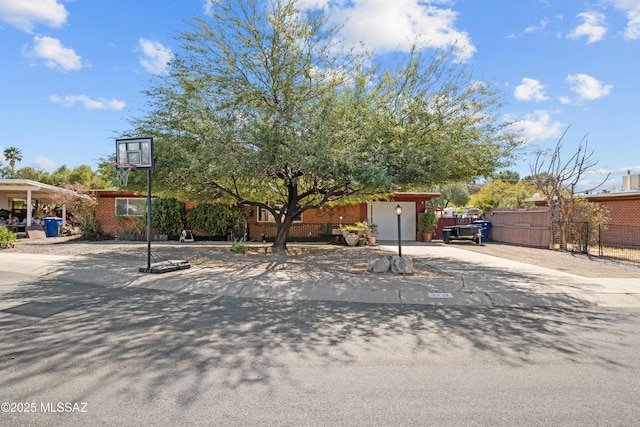 view of property hidden behind natural elements