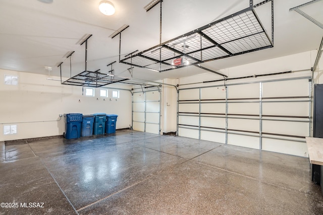 garage featuring baseboards