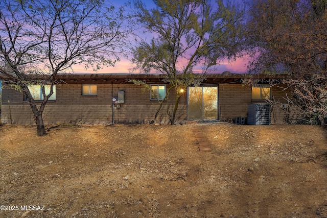 view of home's exterior featuring brick siding