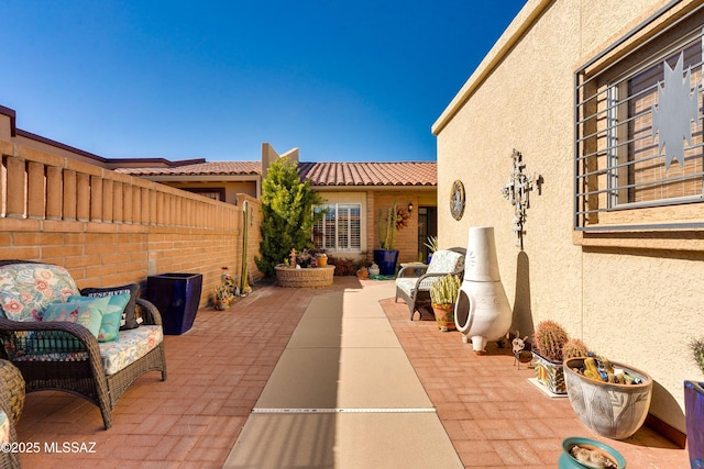 view of patio / terrace with fence