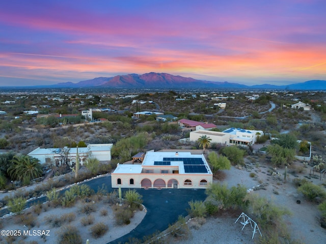 aerial view at dusk with a mountain view