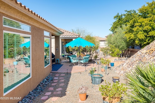 view of patio / terrace with fence