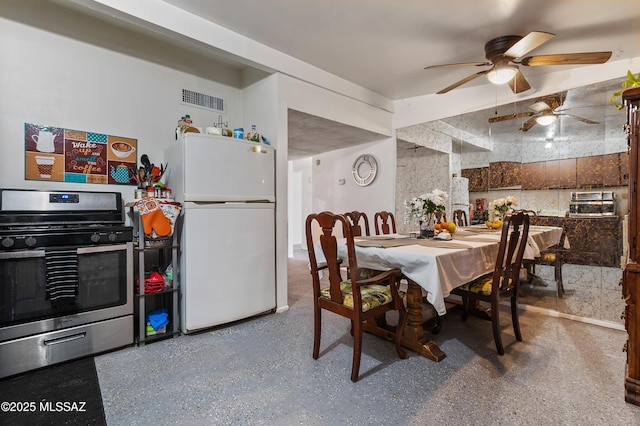 dining room featuring visible vents