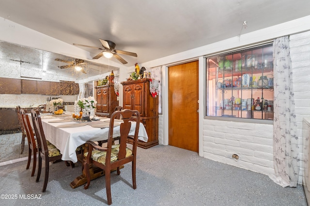 dining room with a ceiling fan