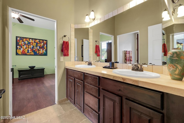 bathroom with tile patterned flooring and vanity