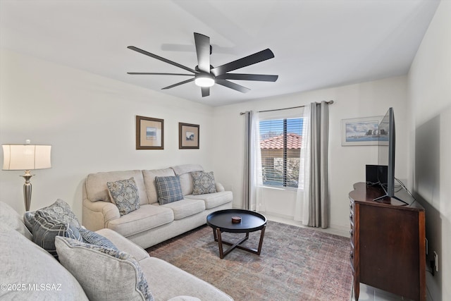 living area with ceiling fan