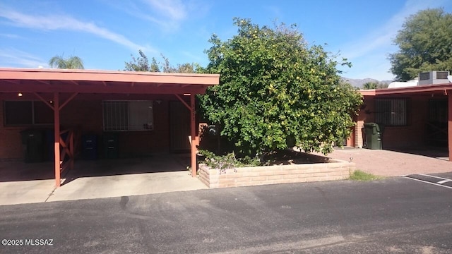 exterior space with an attached carport