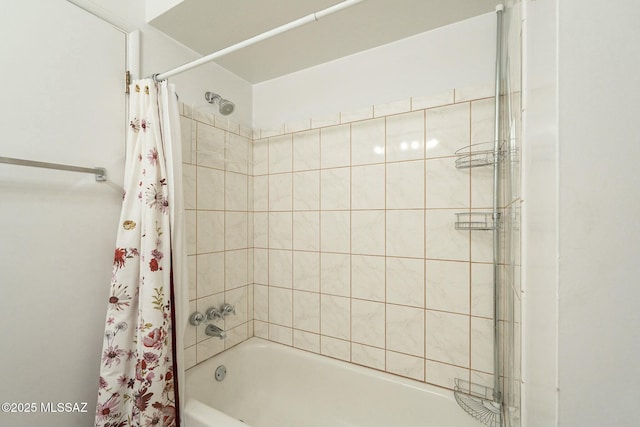 bathroom featuring shower / bathtub combination with curtain