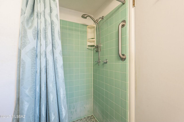 bathroom featuring a stall shower