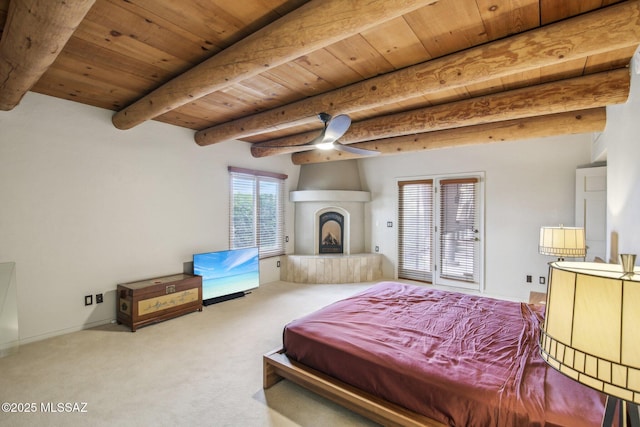 bedroom with carpet flooring, beamed ceiling, and wooden ceiling