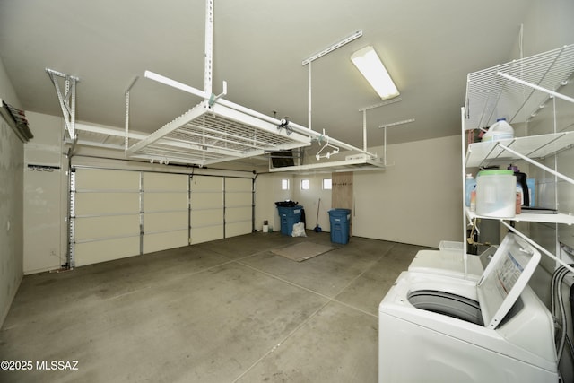 garage with washer and dryer