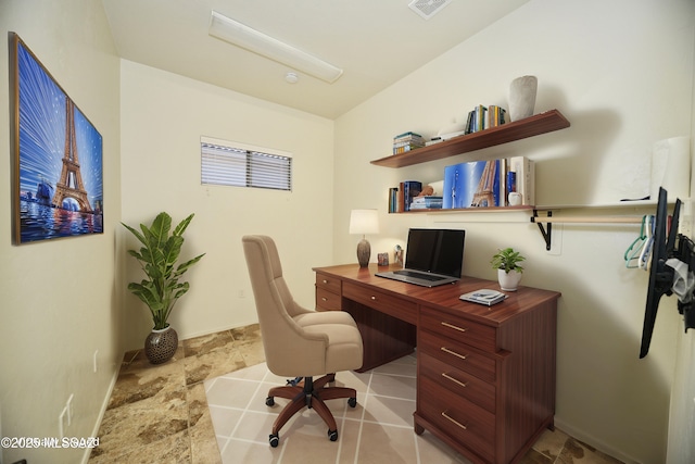 office featuring baseboards and visible vents