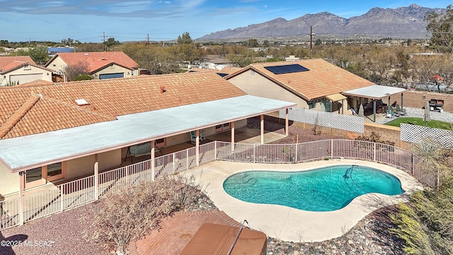 1660 N Fox Run Pl, Tucson, AZ 85715 - view of pool featuring a fenced in pool, a patio, a mountain view, and a fenced backyard