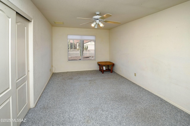 1660 N Fox Run Pl, Tucson, AZ 85715 - empty room featuring visible vents, a ceiling fan, and carpet