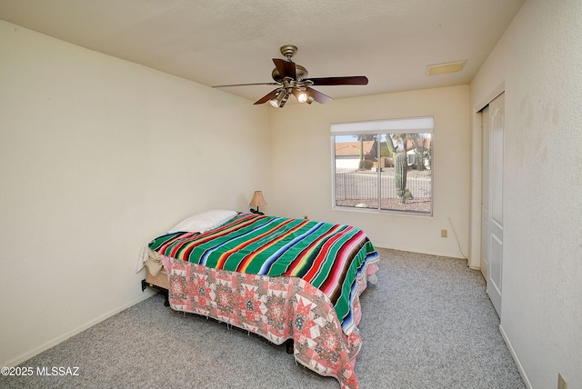 1660 N Fox Run Pl, Tucson, AZ 85715 - bedroom with carpet, visible vents, a closet, and ceiling fan