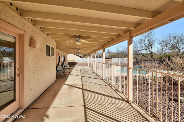 1660 N Fox Run Pl, Tucson, AZ 85715 - view of patio / terrace with a fenced in pool, a fenced backyard, and ceiling fan