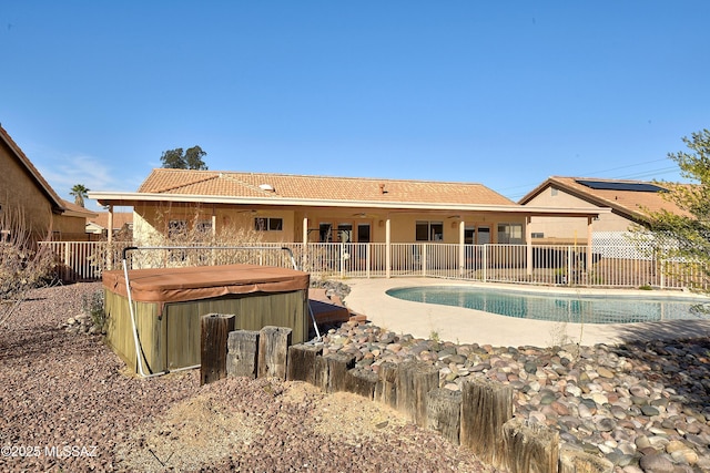1660 N Fox Run Pl, Tucson, AZ 85715 - view of pool featuring a hot tub, a ceiling fan, fence, a patio, and a fenced in pool