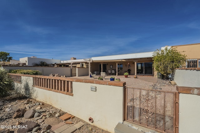 view of front of property featuring a patio