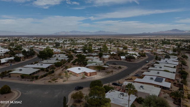 birds eye view of property with a residential view and a mountain view