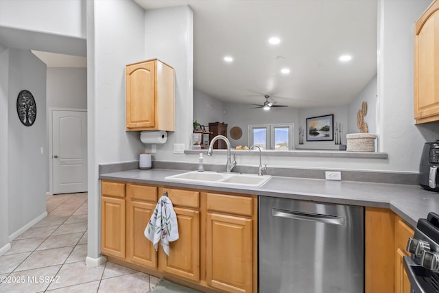kitchen featuring dishwasher, light tile patterned flooring, ceiling fan, stove, and a sink