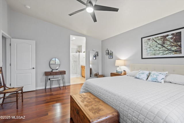 bedroom with wood-type flooring, baseboards, and lofted ceiling
