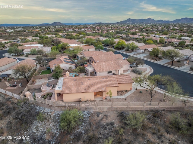 drone / aerial view featuring a mountain view and a residential view