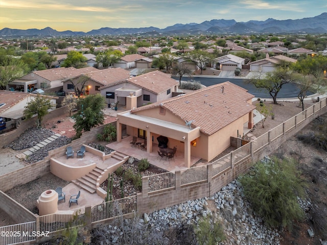 aerial view with a mountain view and a residential view