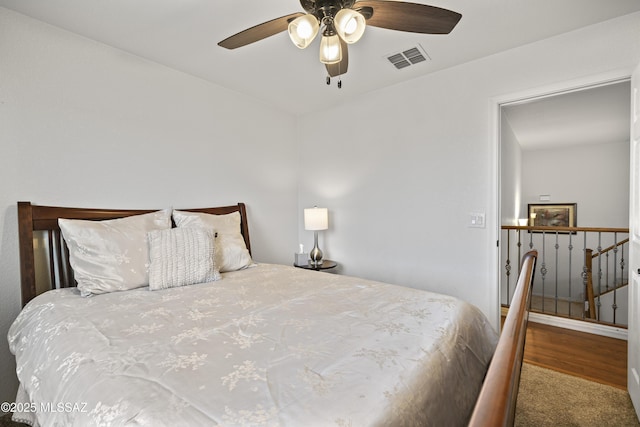 carpeted bedroom featuring ceiling fan