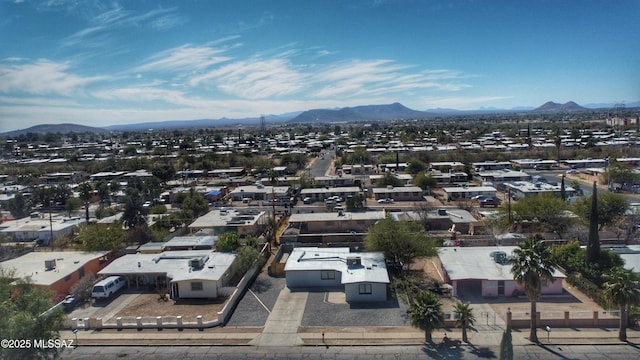 drone / aerial view with a residential view and a mountain view