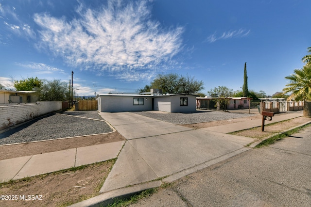 single story home featuring fence private yard