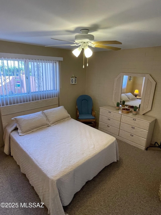 carpeted bedroom featuring a ceiling fan