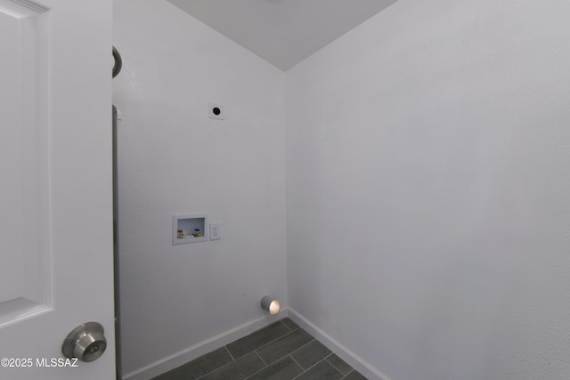 laundry area with electric dryer hookup, baseboards, hookup for a washing machine, and laundry area