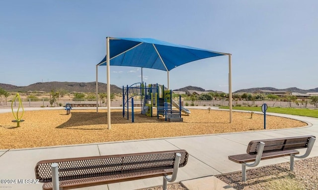 view of play area featuring a mountain view