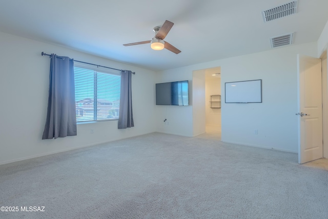 7108 S Via Gaucho Viejo, Tucson, AZ 85756 - empty room with carpet flooring, ceiling fan, and baseboards