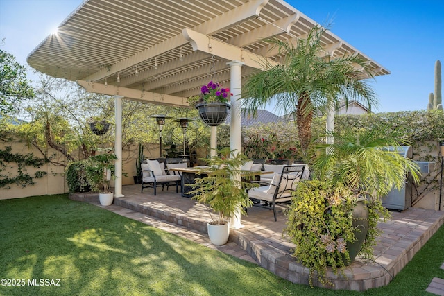 view of patio with outdoor dining area, fence, and a pergola