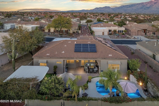 exterior space featuring a mountain view and a residential view