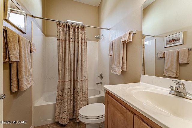 bathroom with vanity, toilet, and shower / bath combo with shower curtain