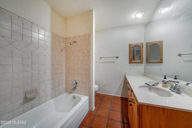 full bath featuring  shower combination, tile patterned flooring, vanity, and toilet