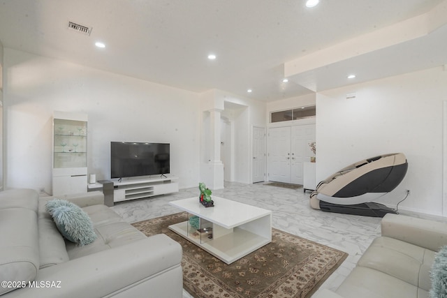 living area with marble finish floor, visible vents, and recessed lighting