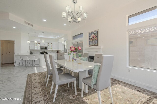 dining space featuring baseboards, visible vents, marble finish floor, a notable chandelier, and recessed lighting