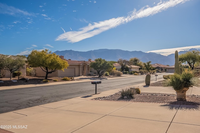 property view of mountains with a residential view