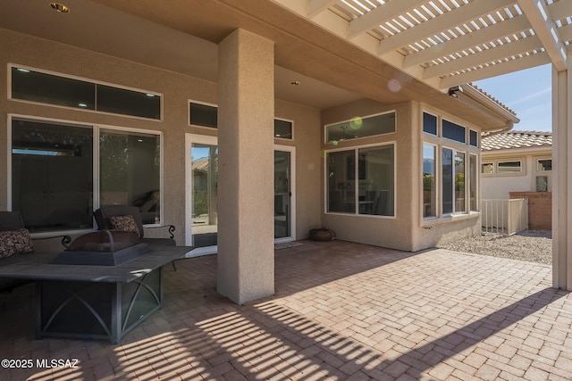 view of patio featuring a pergola