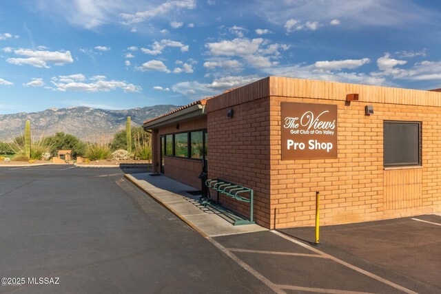 view of building exterior with a mountain view