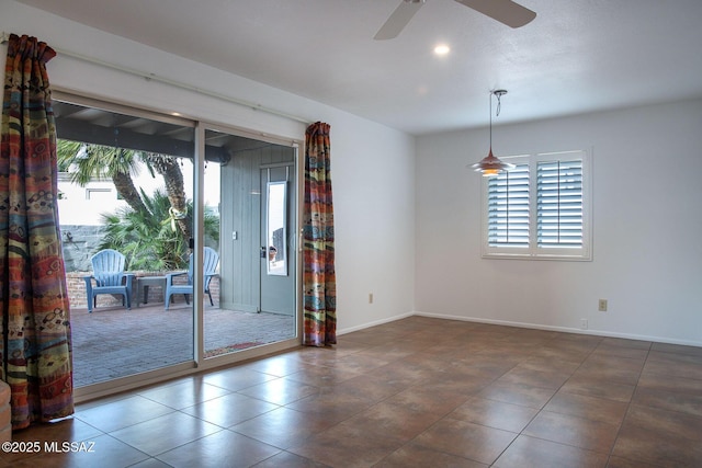 7471 E Serenity Ln, Tucson, AZ 85750 - empty room featuring baseboards, a ceiling fan, tile patterned flooring, and recessed lighting