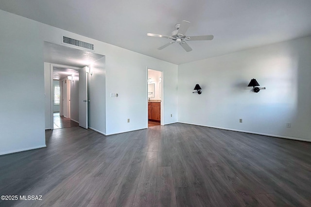 7471 E Serenity Ln, Tucson, AZ 85750 - unfurnished room with ceiling fan, dark wood-style floors, and baseboards