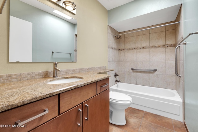 full bath with toilet, vanity, washtub / shower combination, and tile patterned floors